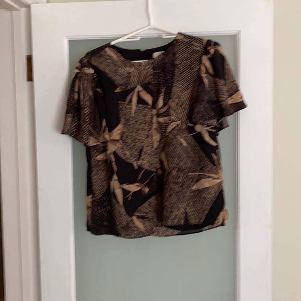 Very nice blouse bought on impulse never worn